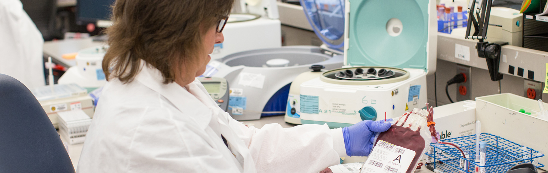 Med Tech Holding a blood pouch