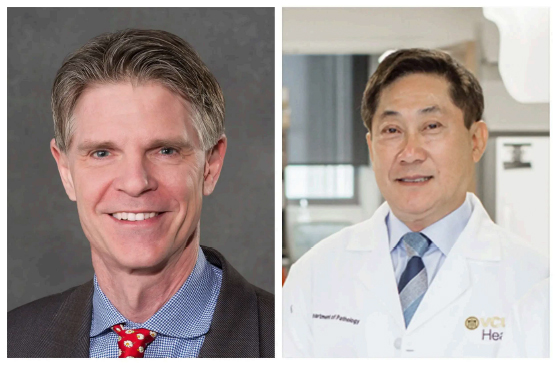 Jason Reed (left) and Youngman Oh are honored for their innovative work in cancer therapy and DNA technology.